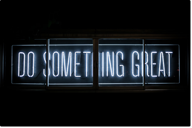 neon sign that says 'do something great'