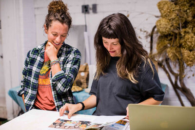 Rooted Farmers team helping growers